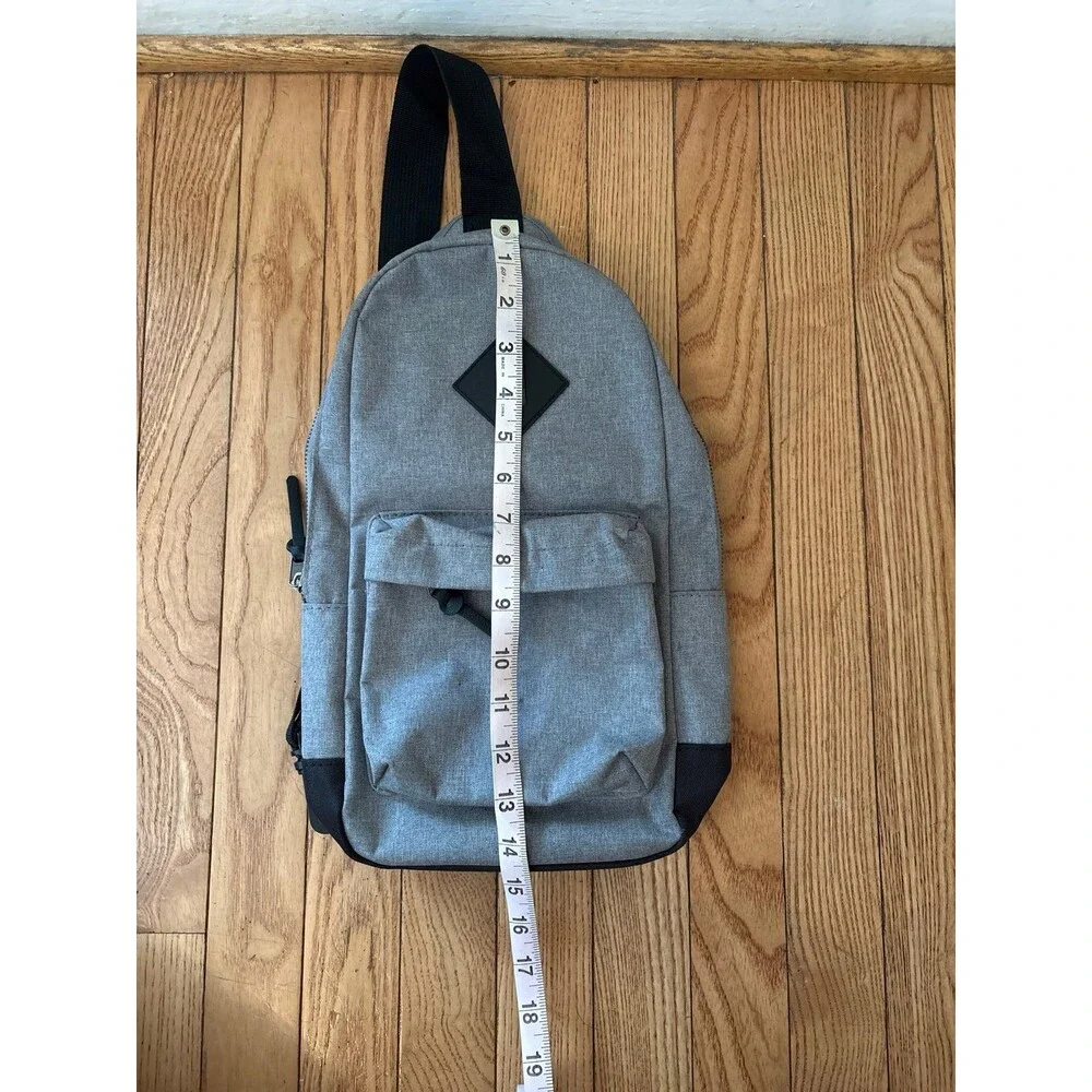 Backpack sling bag crossbody pockets gray black adjustable travel hiking teen